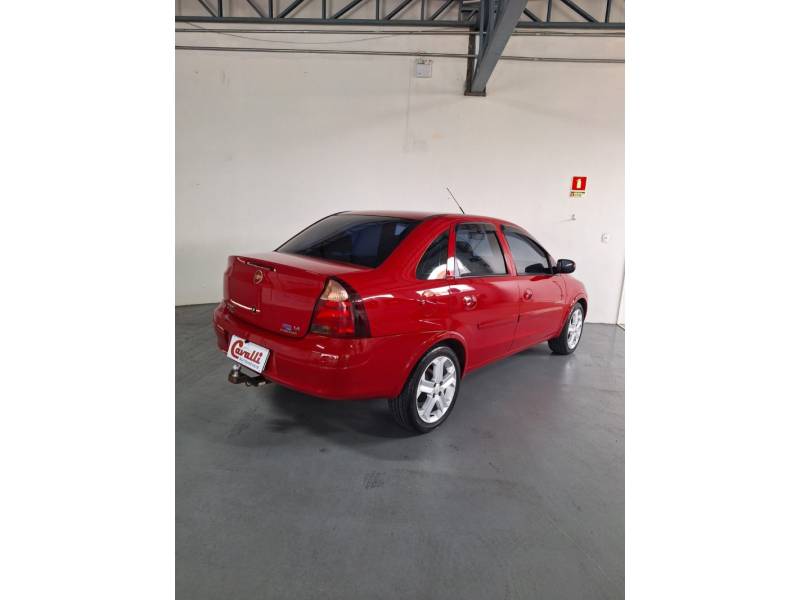 CHEVROLET - CORSA - 2010/2011 - Vermelha - R$ 33.900,00