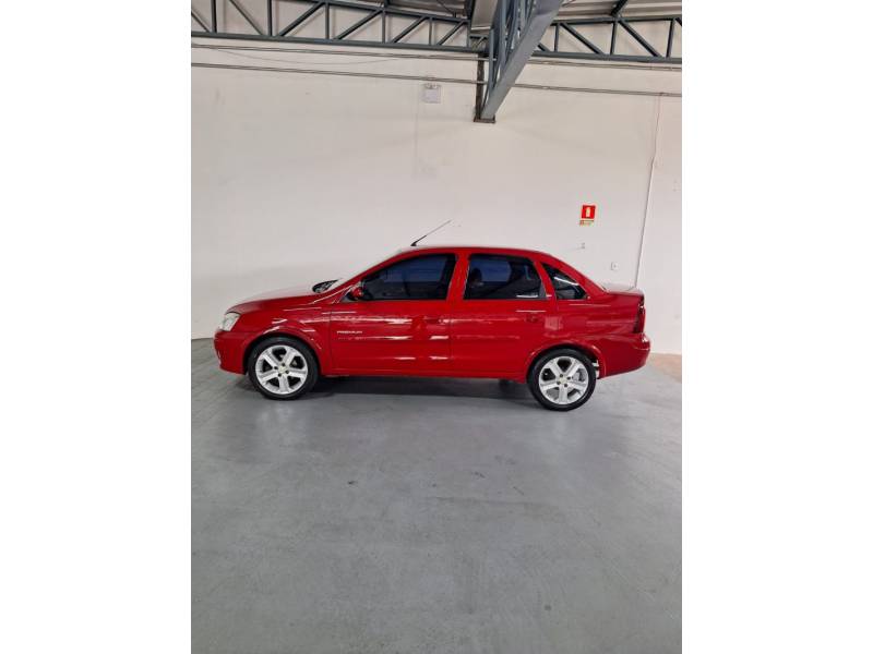 CHEVROLET - CORSA - 2010/2011 - Vermelha - R$ 33.900,00