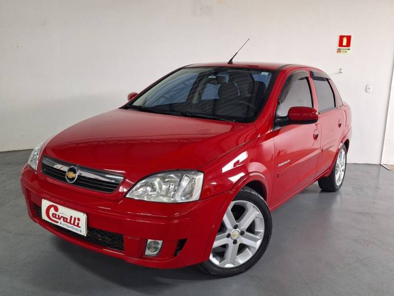 CHEVROLET - CORSA - 2010/2011 - Vermelha - R$ 33.900,00