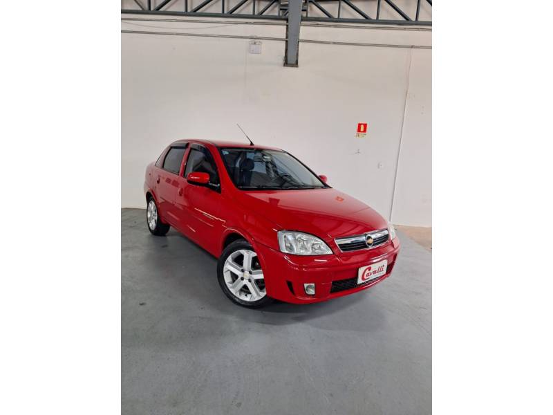 CHEVROLET - CORSA - 2010/2011 - Vermelha - R$ 33.900,00