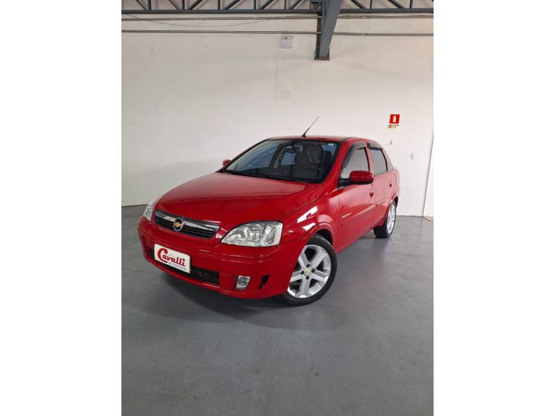 CHEVROLET - CORSA - 2010/2011 - Vermelha - R$ 33.900,00